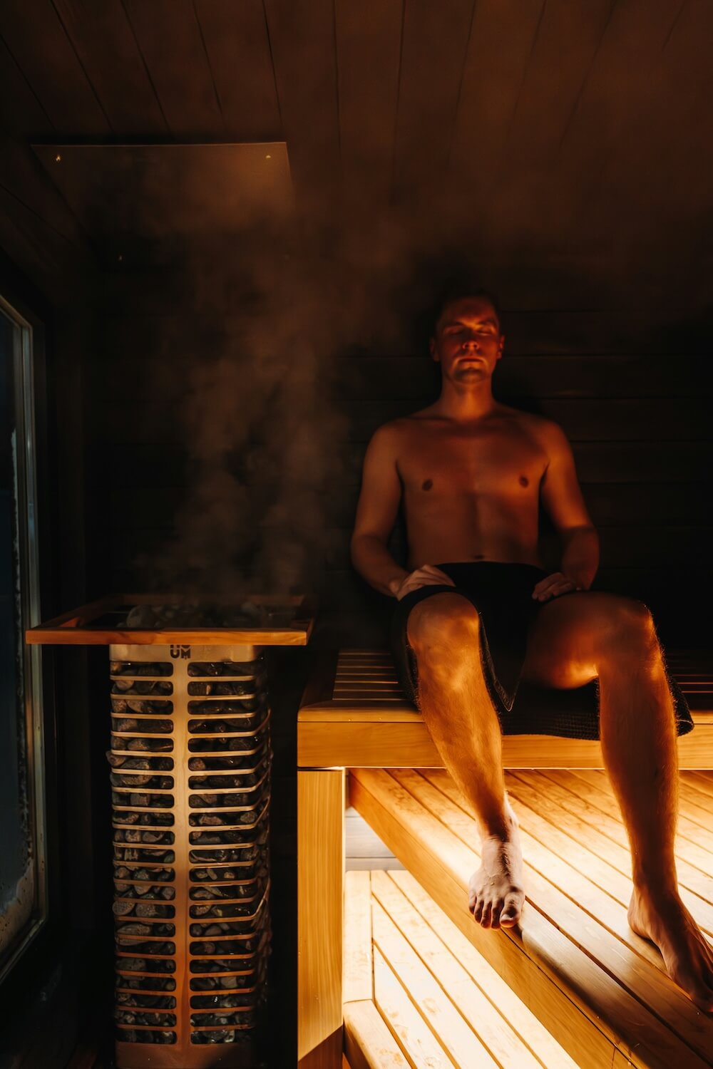 Man sitting in sauna